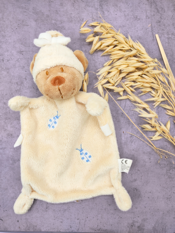 doudou-ours-plat-jaune.png Léon, l'Ours Coquet - Doudou personnalisé