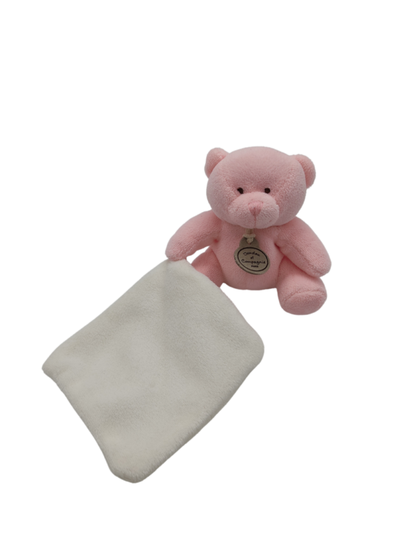 doudou-petit-ours-rose-avec-mouchoir-blanc-doudou-et-compagnie-2.png Emie L'Étreinte Douce